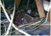 A commercial Melbourne restaurant  with a mass of illegal and unsafe cabling.